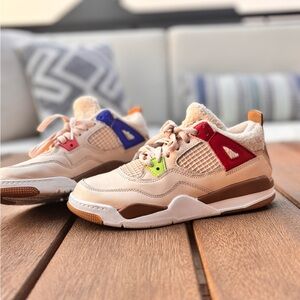Lightly used Nike Jordan 4 Wild Things size 3y